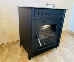 Estufa de leña grande con salida de humos por detras y horno - 3