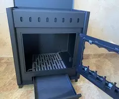 Estufa de leña grande con salida de humos por detras y horno - 4